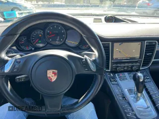 2014 Porsche Panamera z VIN WP0AA2A71EL010339, wystawiony jako Copart lot #53249195 z przebiegiem 94 880 mil mil oraz Czysty tytuł • Clean title. Historia ofert i sprzedaży dostępna na DreamBid. Obrazek 7.