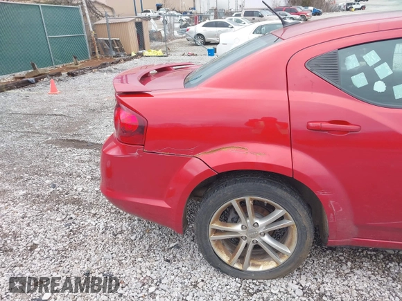 2014 Dodge Avenger SE with VIN 1C3CDZAB0EN220002, listed as a IAAI auction lot 41719914 with 165,330 mi miles and . Bid and sale history available at DreamBid. Image 14.