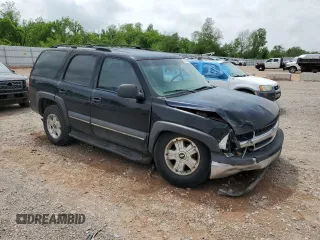 2002 Chevrolet Tahoe LT with VIN 1GNEC13Z52R303777, listed as a Copart auction lot 54942055 with 291,043 mi miles and Salvage title. Bid and sale history available at DreamBid. Image 4.