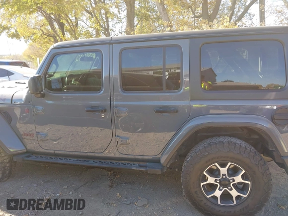2019 Jeep Wrangler Unlimited Rubicon with VIN 1C4HJXFN7KW681365, listed as a IAAI auction lot 40686862 with 29,431 mi miles and . Bid and sale history available at DreamBid. Image 14.