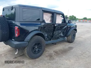 2024 Ford Bronco Wildtrak with VIN 1FMEE2BP1RLA75293, listed as a IAAI auction lot 42199529 with 6,466 mi miles and . Bid and sale history available at DreamBid. Image 4.