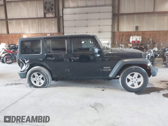 2018 Jeep Wrangler Unlimited Sport S with VIN 1C4HJWDG5JL888349, listed as a IAAI auction lot 40764318 with 61,419 mi miles and . Bid and sale history available at DreamBid. Image 13.