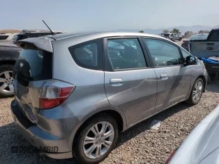 2010 Honda Fit Sport with VIN JHMGE8H41AC002070, listed as a Copart auction lot 62356565 with 148,279 mi miles and Salvage title. Bid and sale history available at DreamBid. Image 3.
