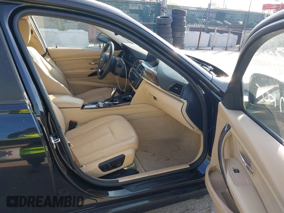 2014 BMW 3 Series 328i xDrive with VIN WBA3B5G56ENS06890, listed as a IAAI auction lot 42168982 with 133,664 mi miles. Bid and sale history available at carsss.com. Image 5.
