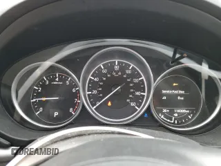 2018 Mazda CX-5 Touring z VIN JM3KFACM9J0300642, wystawiony jako Copart lot #80210854 z przebiegiem 118 309 mil mil oraz Szkoda całkowita • Salvage title. Historia ofert i sprzedaży dostępna na DreamBid. Obrazek 9.