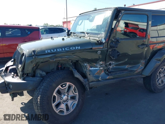 2015 Jeep Wrangler Rubicon Hard Rock with VIN 1C4BJWCGXFL771669, listed as a IAAI auction lot 42057423 with 36,996 mi miles and . Bid and sale history available at DreamBid. Image 6.
