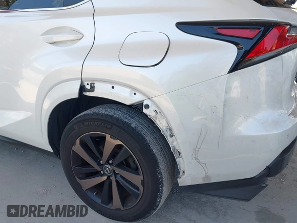 2020 Lexus NX 300 with VIN JTJGARBZ4L2169052, listed as a IAAI auction lot 42258498 with 83,121 mi miles and . Bid and sale history available at DreamBid. Image 18.