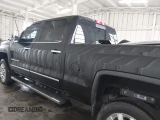 2016 GMC Sierra 2500HD Denali z VIN 1GT12UE82GF207890, wystawiony jako IAAI lot #41994971 z przebiegiem 101 221 mil mil oraz . Historia ofert i sprzedaży dostępna na DreamBid. Obrazek 14.