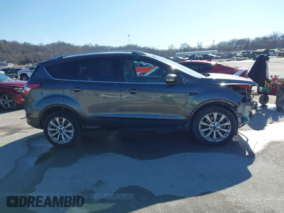 2017 Ford Escape Titanium with VIN 1FMCU0J92HUA26226, listed as a IAAI auction lot 41423259 with 111,076 mi miles. Bid and sale history available at carsss.com. Image 13.