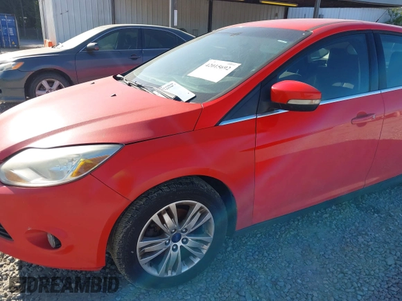 2012 Ford Focus SEL with VIN 1FAHP3M20CL393440, listed as a IAAI auction lot 42015692 with 198,214 mi miles. Bid and sale history available at carsss.com. Image 6.