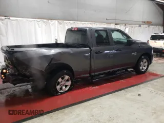 2018 Ram 1500 Express with VIN 1C6RR7FG6JS282197, listed as a Copart auction lot 82840704 with 150,019 mi miles and Salvage title. Bid and sale history available at DreamBid. Image 3.