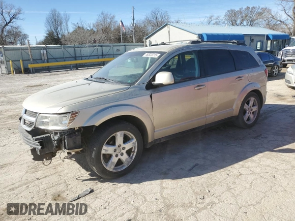 2010 Dodge Journey SXT with VIN 3D4PH5FV5AT169610, listed as a Copart auction lot 49323215 with 243,471 mi miles and Salvage Title. Bid and sale history available at carsss.com. Image 1.