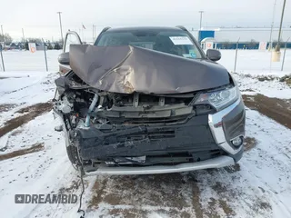 2016 Mitsubishi Outlander SE with VIN JA4AZ3A33GZ051271, listed as a IAAI auction lot 41161321 with 61,306 mi miles and . Bid and sale history available at DreamBid. Image 6.