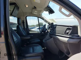 2020 Ford Transit Passenger XL z VIN 1FBAX2YG0LKA55428, wystawiony jako IAAI lot #42356622 z przebiegiem 89 748 mil mil oraz . Historia ofert i sprzedaży dostępna na DreamBid. Obrazek 5.