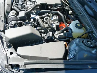 2025 Toyota Camry LE with VIN 4T1DAACK1SU595949, listed as a IAAI auction lot 43359271 with 12,864 mi miles and . Bid and sale history available at DreamBid. Image 20.