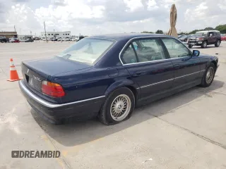 1997 BMW 7 Series 740il with VIN WBAGJ8324VDM02317, listed as a Copart auction lot 64879564 with 107,365 mi miles and Salvage Title. Bid and sale history available at carsss.com. Image 3.