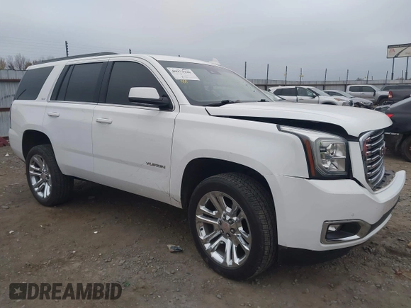 2018 GMC Yukon SLT with VIN 1GKS1BKC3JR279163, listed as a IAAI auction lot 40973940 with 122,445 mi miles. Bid and sale history available at carsss.com. Image 13.