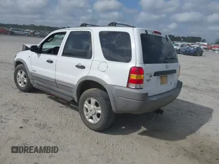 2002 Ford Escape XLT Choice with VIN 1FMYU03102KB44453, listed as a IAAI auction lot 41951739 with 331,792 mi miles and . Bid and sale history available at DreamBid. Image 3.
