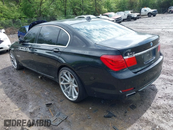 2011 BMW 7 Series 740Li with VIN WBAKB4C5XBC392890, listed as a IAAI auction lot 42108817 with 162,874 mi miles. Bid and sale history available at carsss.com. Image 3.