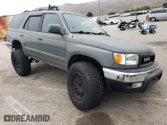 1999 Toyota 4Runner SR5 with VIN JT3GN86R4X0095939, listed as a Copart auction lot 60755965 with 276,622 mi miles and Salvage title. Bid and sale history available at DreamBid. Image 4.