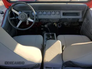 1991 Jeep Wrangler z VIN 2J4FY19P6MJ107521, wystawiony jako Copart lot #84077214 z przebiegiem 1 311 216 mil mil oraz Czysty tytuł • Clean title. Historia ofert i sprzedaży dostępna na DreamBid. Obrazek 8.