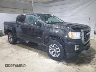 2021 GMC Canyon 4WD AT4 w/Leather with VIN 1GTG6FEN8M1255144, listed as a Copart auction lot 50186815 with 43,610 mi miles and Salvage Title. Bid and sale history available at carsss.com. Image 4.