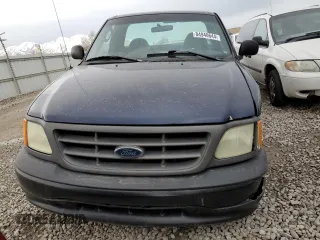 2004 Ford F-150 XL with VIN 2FTPF17Z44CA67318, listed as a Copart auction lot 84940644 with 87,057 mi miles and Salvage title. Bid and sale history available at DreamBid. Image 5.