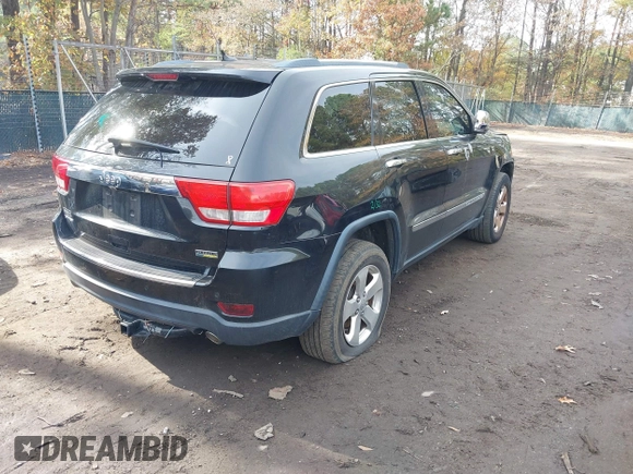 2013 Jeep Grand Cherokee Limited with VIN 1C4RJEBG6DC656719, listed as a IAAI auction lot 40897970 with 133,947 mi miles. Bid and sale history available at carsss.com. Image 4.
