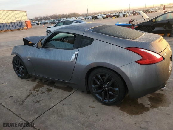 2016 Nissan 370Z with VIN JN1AZ4EH4GM932451, listed as a Copart auction lot 86707364 with 0 miles and Salvage Title. Bid and sale history available at carsss.com. Image 2.