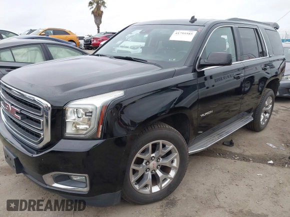 2015 GMC Yukon SLT with VIN 1GKS1BKC3FR129173, listed as a IAAI auction lot 41795585 with 97,893 mi miles. Bid and sale history available at carsss.com. Image 22.
