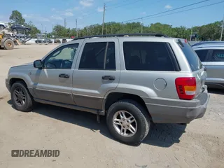 2004 Jeep Grand Cherokee Laredo z VIN 1J4GW48SX4C283922, wystawiony jako IAAI lot #42306869 z przebiegiem 263 812 mil mil oraz . Historia ofert i sprzedaży dostępna na DreamBid. Obrazek 13.