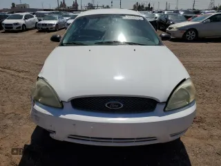 2006 Ford Taurus SE with VIN 1FAFP53UX6A194398, listed as a Copart auction lot 59582515 with 114,933 mi miles and Salvage title. Bid and sale history available at DreamBid. Image 5.
