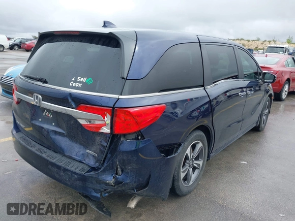 2018 Honda Odyssey Touring with VIN 5FNRL6H85JB001501, listed as a IAAI auction lot 41911497 with 92,407 mi miles. Bid and sale history available at carsss.com. Image 4.