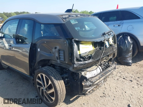 2017 BMW i3 z VIN WBY1Z8C37HV895319, wystawiony jako IAAI lot #42005859 z przebiegiem 84 271 mil mil oraz . Historia ofert i sprzedaży dostępna na DreamBid. Obrazek 6.