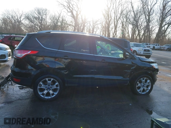 2014 Ford Escape Titanium with VIN 1FMCU0JX0EUC21512, listed as a IAAI auction lot 41781026 with 142,771 mi miles. Bid and sale history available at carsss.com. Image 13.