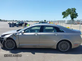 2016 Lincoln MKZ Hybrid with VIN 3LN6L2LU8GR613310, listed as a IAAI auction lot 41986892 with 114,087 mi miles. Bid and sale history available at carsss.com. Image 14.