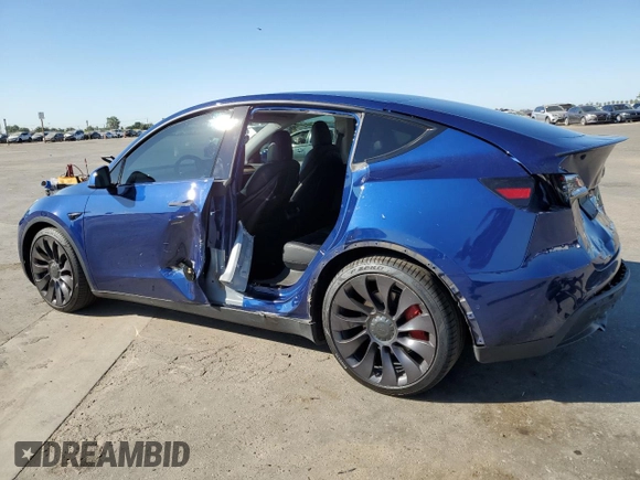 2021 Tesla Model Y Performance with VIN 5YJYGDEF0MF262336, listed as a Copart auction lot 60618534 with 29,242 mi miles and Salvage Title. Bid and sale history available at DreamBid. Image 2.