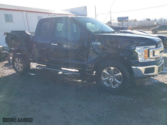 2018 Ford F-150 XL with VIN 1FTFX1E54JFB12847, listed as a IAAI auction lot 41733325 with 162,546 mi miles. Bid and sale history available at carsss.com. Image 1.