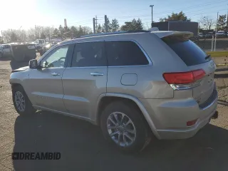 2015 Jeep Grand Cherokee High Altitude with VIN 1C4RJFCM6FC878769, listed as a Copart auction lot 46704755 with 81,727 mi miles and Salvage title. Bid and sale history available at DreamBid. Image 2.