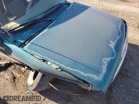1995 Ford Ranger XL z VIN 1FTCR14A3SPA94820, wystawiony jako Copart lot #86786014 z przebiegiem Nie podano mil oraz Nie do naprawy • Non repairable. Historia ofert i sprzedaży dostępna na DreamBid. Obrazek 11.