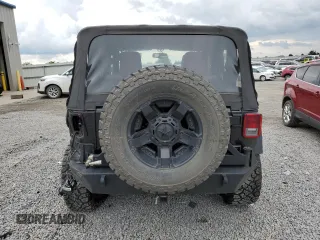 2014 Jeep Wrangler Sport with VIN 1C4AJWAG5EL326480, listed as a Copart auction lot 60653955 with 94,102 mi miles and Salvage title. Bid and sale history available at DreamBid. Image 6.