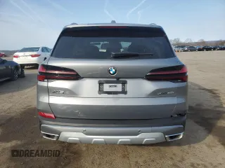 2025 BMW X5 xDrive40i with VIN 5UX23EU01S9Z44555, listed as a Copart auction lot 48656295 with 90 mi miles and Salvage Title. Bid and sale history available at carsss.com. Image 6.