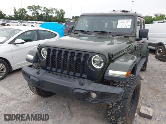 2022 Jeep Gladiator Texas Trail z VIN 1C6HJTAG1NL105124, wystawiony jako IAAI lot #42601707 z przebiegiem 52 064 mil mil oraz . Historia ofert i sprzedaży dostępna na DreamBid. Obrazek 6.