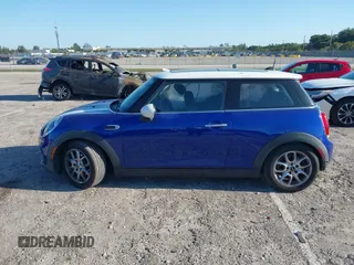2019 MINI Hardtop Cooper with VIN WMWXP5C52K2H97728, listed as a IAAI auction lot 42026666 with 61,464 mi miles and . Bid and sale history available at DreamBid. Image 14.