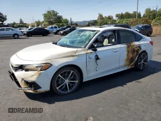 2024 Honda Civic Touring with VIN 2HGFE1F91RH307193, listed as a Copart auction lot 60373415 with 14,385 mi miles and Salvage title. Bid and sale history available at DreamBid. Image 1.