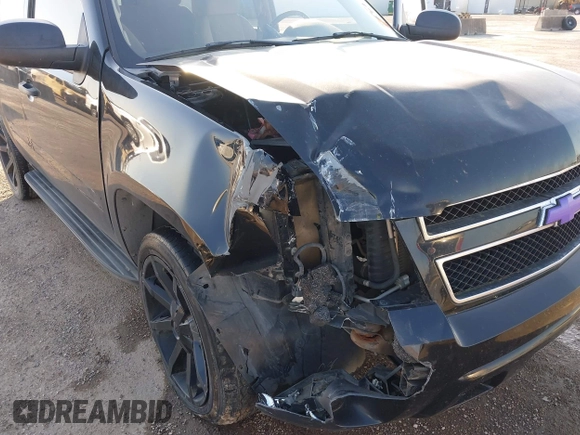 2007 Chevrolet Tahoe LS with VIN 1GNFC13CX7R406202, listed as a IAAI auction lot 41951878 with 181,571 mi miles and . Bid and sale history available at DreamBid. Image 6.