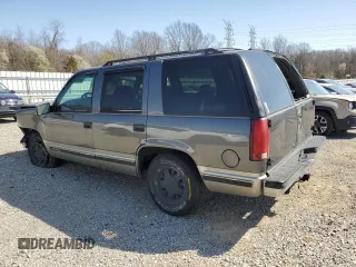 1999 GMC Yukon with VIN 1GKEC13R9XJ805842, listed as a Copart auction lot 48952625 with 259,149 mi miles and Clean Title. Bid and sale history available at carsss.com. Image 2.