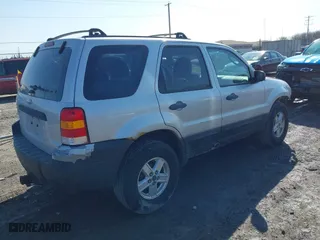 2007 Ford Escape XLS with VIN 1FMYU92Z87KA05657, listed as a IAAI auction lot 41723701 with 152,713 mi miles. Bid and sale history available at carsss.com. Image 4.