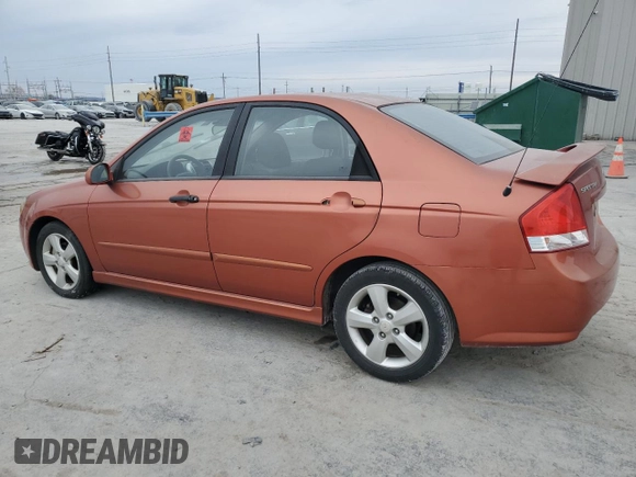 2009 Kia Spectra SX with VIN KNAFE221095026589, listed as a Copart auction lot 45005514 with 203,779 mi miles and Salvage Title. Bid and sale history available at carsss.com. Image 2.