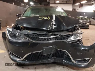 2020 Chrysler Pacifica Touring L with VIN 2C4RC1BG2LR280156, listed as a IAAI auction lot 42182406 with 105,038 mi miles and . Bid and sale history available at DreamBid. Image 12.